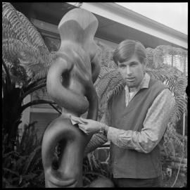 Jon Freeland with his carving Raurangi