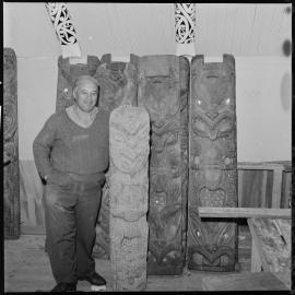 Eddie Heke beside poupou in Hangarau