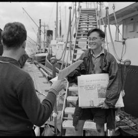 Brent McConachy selling Bay of Plenty Times newspapers at Mount Wharf