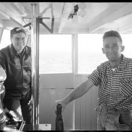 Capt. B. Logan (Right) Mr G. Cooper on board Otapiri