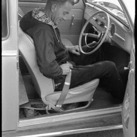 Mr Bill Howard demonstrating with safety belt. 