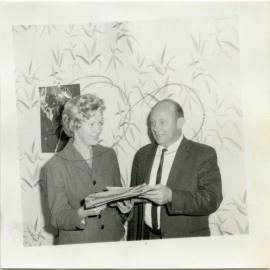 Mr Hardaker gives Mrs Parnwell details of company offer