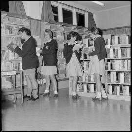 Ōtūmoetai College pupils in Library: Douglas Rendell, Barbara McVeigh, Margaret Hall, Annemieke Vandervorn
