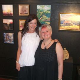 Gaye and Bev of Harrison’s with some of the ‘Pure Gold’ paintings 