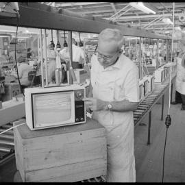 TISCO  Technician adjusts the picture tube
