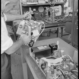 TISCO  Technician adjusts the picture tube