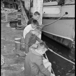 Anzac Day fishermen at Fisherman's Wharf, Tauranga  