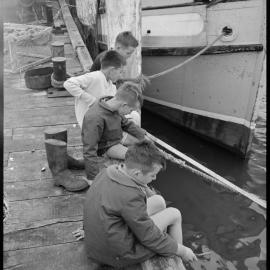 Anzac Day fishermen at Fisherman's Wharf, Tauranga  