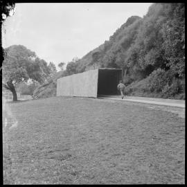 A small visitor runs to investigate a tunnel of the Mount Drury (Hopukiore) Railway line.