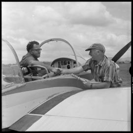Mr R.J. Fisher congratulated by Mr W.F. Christophersen, Aero Club