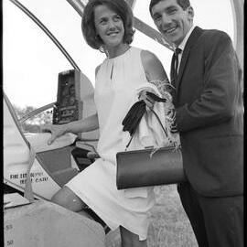 Mr & Mrs Morrison climb aboard the helicopter