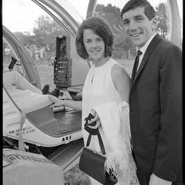 Mr & Mrs Morrison climb aboard the helicopter