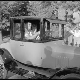Mr & Mrs Morrison in vintage car