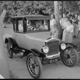 Mr & Mrs Morrison in vintage car
