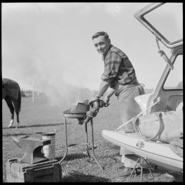 Mr Honeyfield, Tauranga farrier, with his portable forge at Green Park School