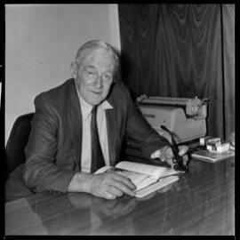 Mr G. K. Prebble with his new book, "Tūhua, Mayor Island".