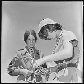 Girl guides learning how to tie ropes, Fergusson Park, Ōtūmoetai 