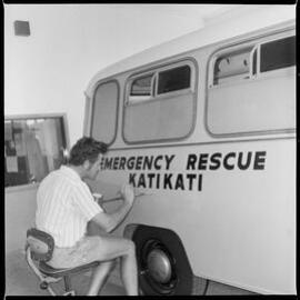 Painting emergency rescue vehicle