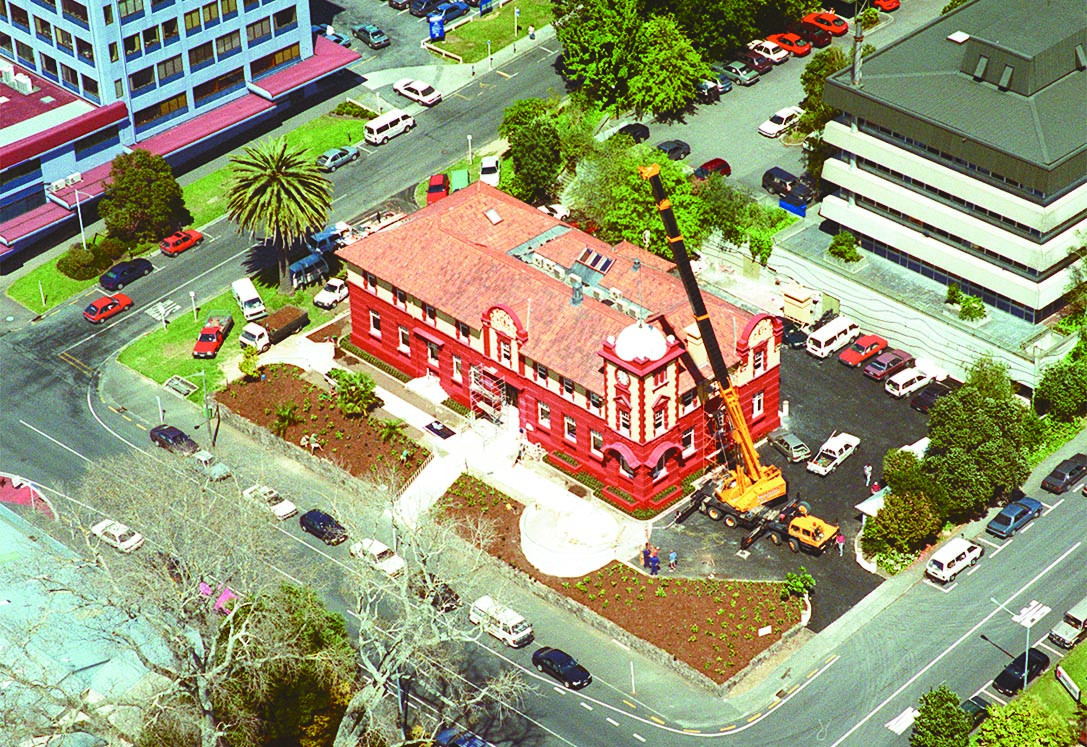 Aerial of the Post Office bell  being reinstalled behind the clock face. 
Photo NZME-CD014-199909-E2716