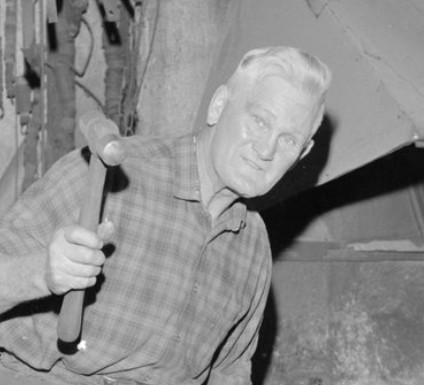Charlie Haua at his Grey Street Blacksmithy in 1967, a cropped image from photo gca-16072.