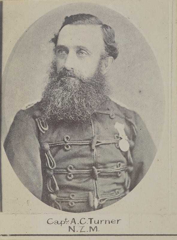 Copy photograph of a studio portrait of Captain Archibald Campbell Turner. Turner is wearing military uniform and has a medal pinned to his chest. He has a beard. The photograph is included on page 5 of William Francis Robert Gordon's album "Some "Soldiers of the Queen" who served in the Maori Wars and Other Notable Persons Connected Herewith".

Puri Ariki Reference PHO2011-2311