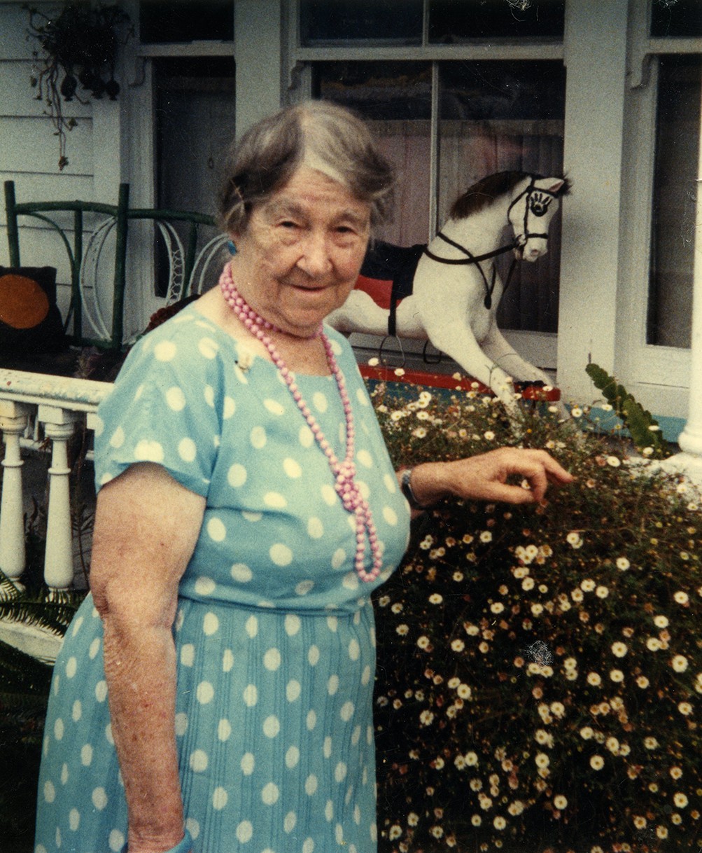 Mrs Violet Simons outside her home on Cameron Road. Image courtesy of the Wilson Collection, Tauranga Heritage Collection