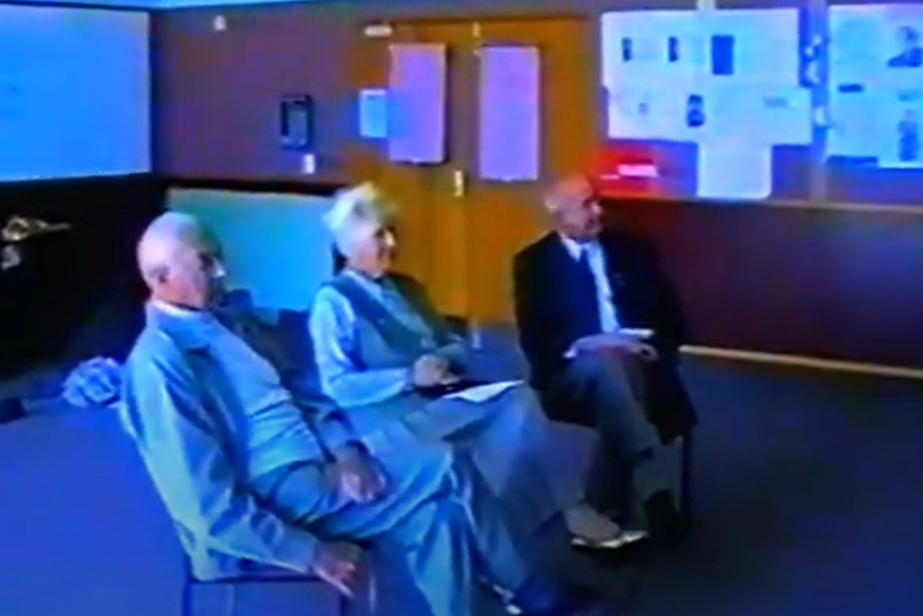 Allan Yeoman, Peg Wallis and Doug Baker in a classroom talking about their experiences