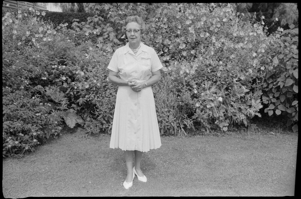 Mrs Roden posing in her suburban garden, 1963.
Te Ao Mārama - Tauranga City Libraries Photo gcc-1189